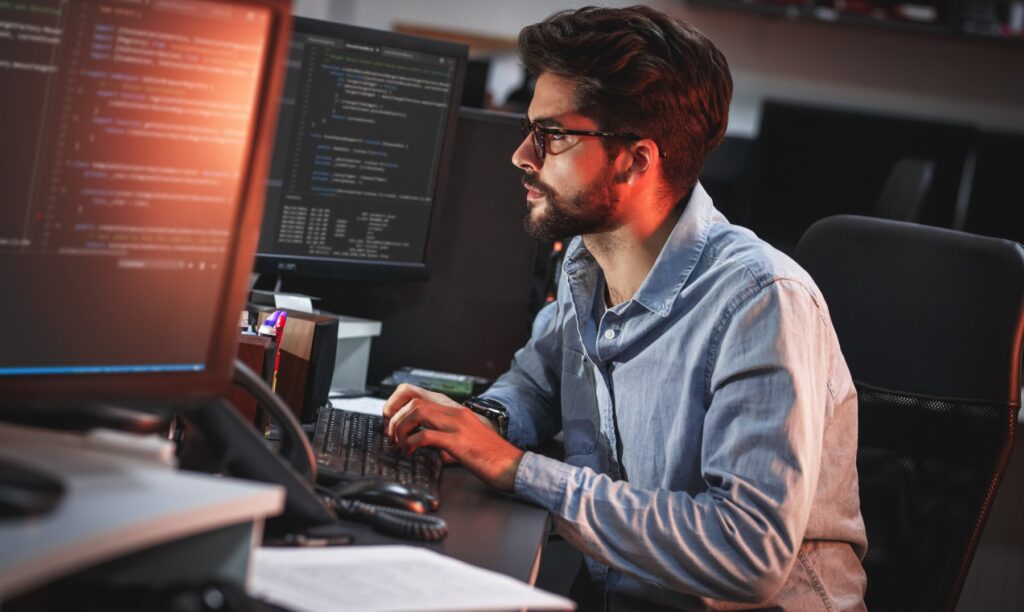 male-programmer-working-on-new-project-picture-id1274948583-1024x612